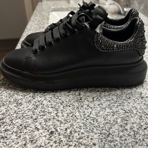 All black studded Alexander McQueen’s